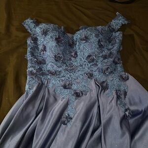 Loved this dress it is kind of heavy love the material